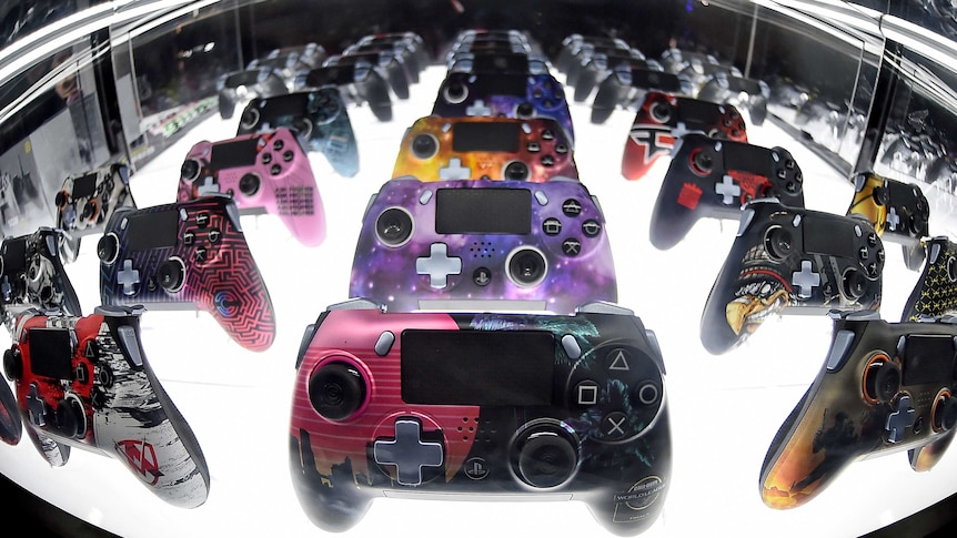 A multi-coloured array of video game handsets
