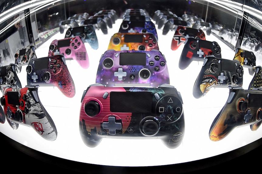 A multi-coloured array of video game handsets