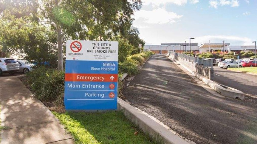 The sign showing directions on the grounds of the griffith base hospital, car parks left and right