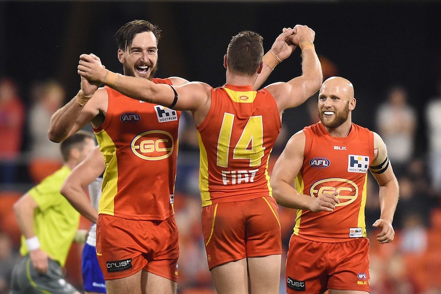 Charlie Dixon celebrates a goal for the Suns