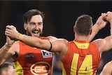 Gold Coast's Charlie Dixon reacts after kicking a goal against North Melbourne in July 2015.