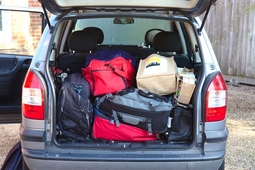 A car boot full of luggage