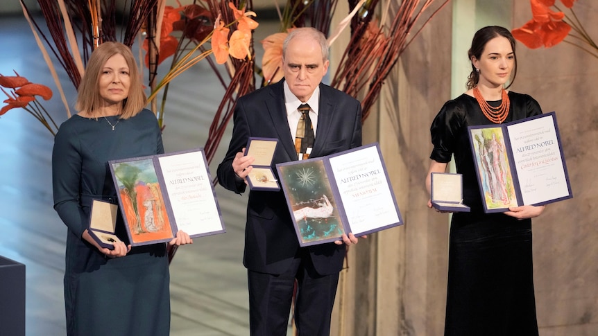  2022 Nobel Peace Prize laureates receive their awards.