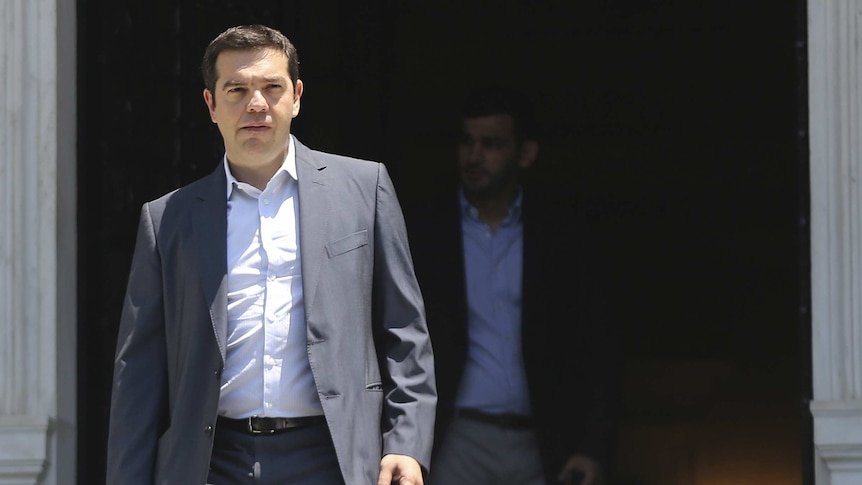 Greek Prime Minister Alexis Tsipras leaves his office in Maximos Mansion in Athens, Greece July 9, 2015.