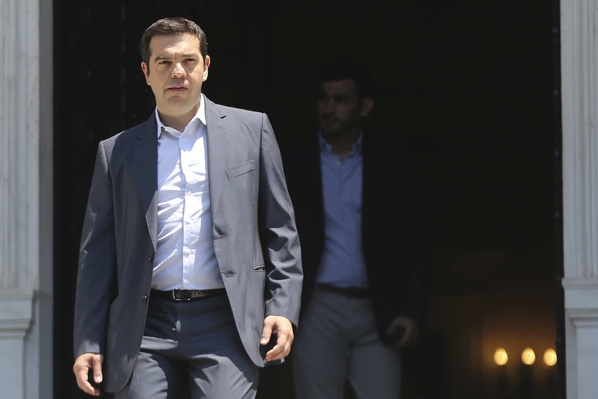 Greek Prime Minister Alexis Tsipras leaves his office in Maximos Mansion in Athens, Greece July 9, 2015.