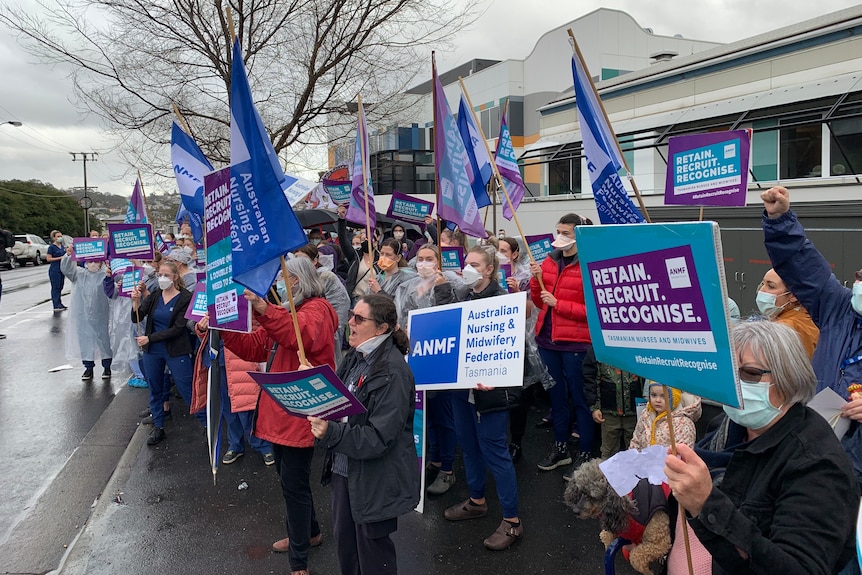 A line of nurses protest in Launceston.