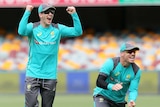 Australian players cheer at training