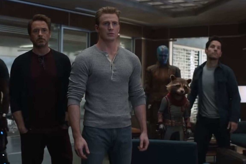 A number of Avengers stand together in a screenshot from the Avengers: Endgame trailer.
