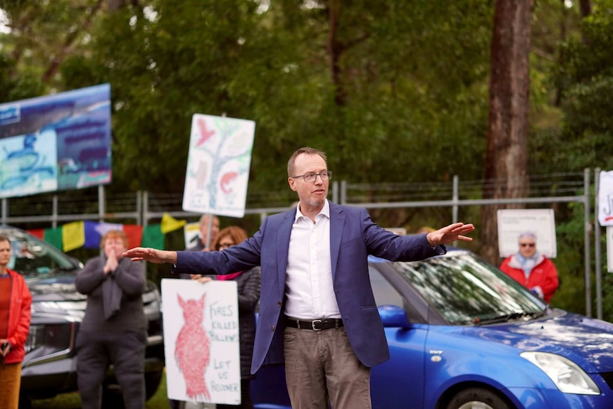 Greens MP David Shoebridge addresses protestors at Manyana.