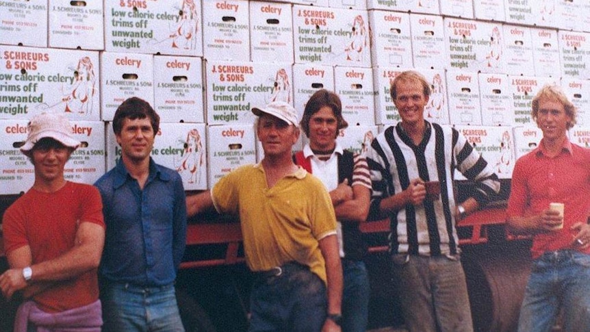 Schreurs family in the 1970s in front of boxes with the old logo.