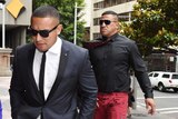Jamil Hopoate entering court with father John