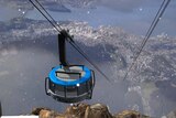 An artist's impression of the cable car leaving the mountain summit