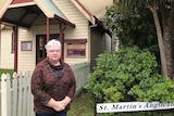 Shirley Scolyer in front of St Martin's Anglican Church