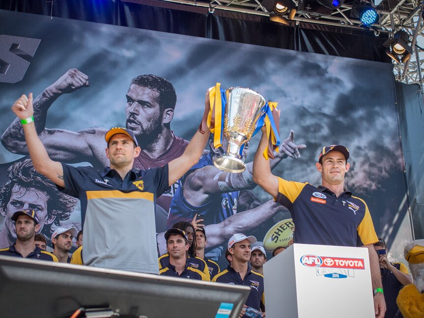 Luke Hodge and Shannon Hurn with 2015 AFL cup