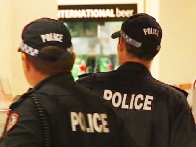 NT Police officers at a Northern Territory bottle shop