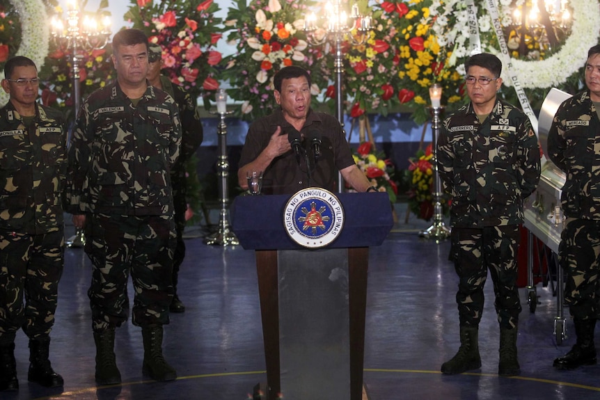 Philippine President Rodrigo Duterte speaks at a military camp in Davao city.