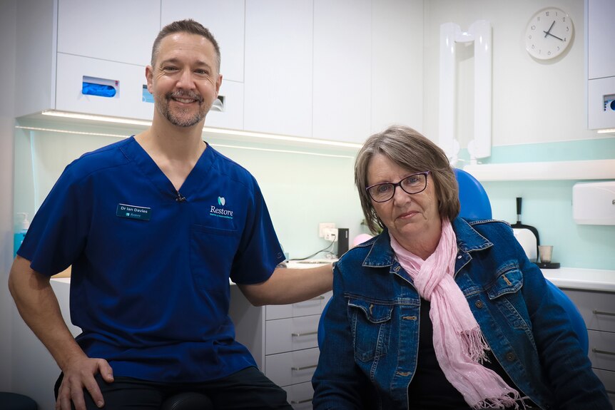 Cheryl Hart with her dentist Ian Davies in his surgery