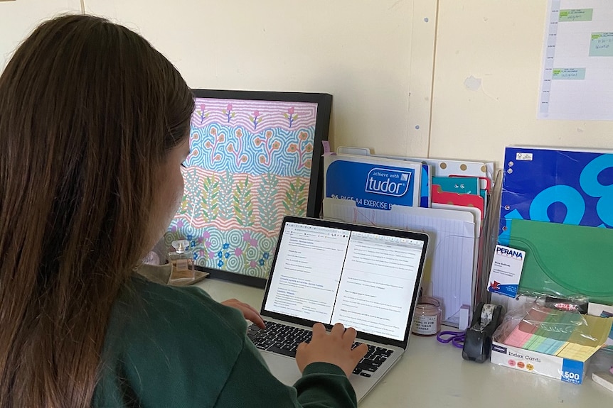 Lily studies her degree online because of Victoria's current coronavirus restrictions