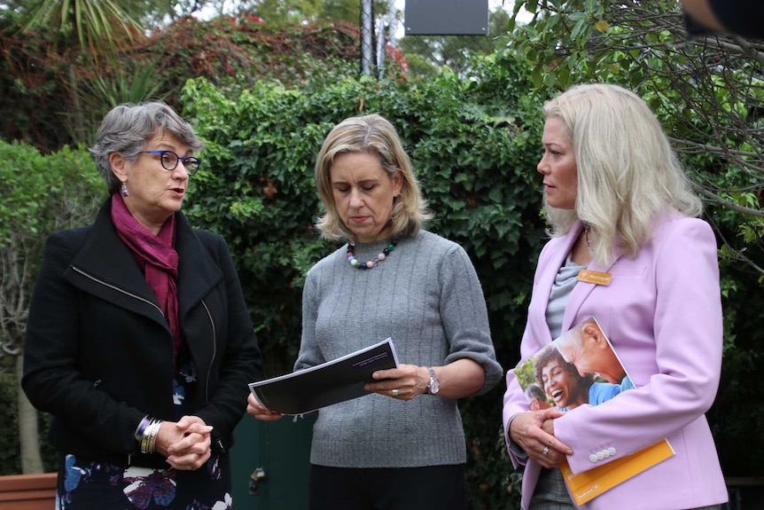 Advocare CEO Diedre Timms, Prevention of Family and Domestic Violence Minister Simone McGurk and Bankwest's Shari Cosgriff.