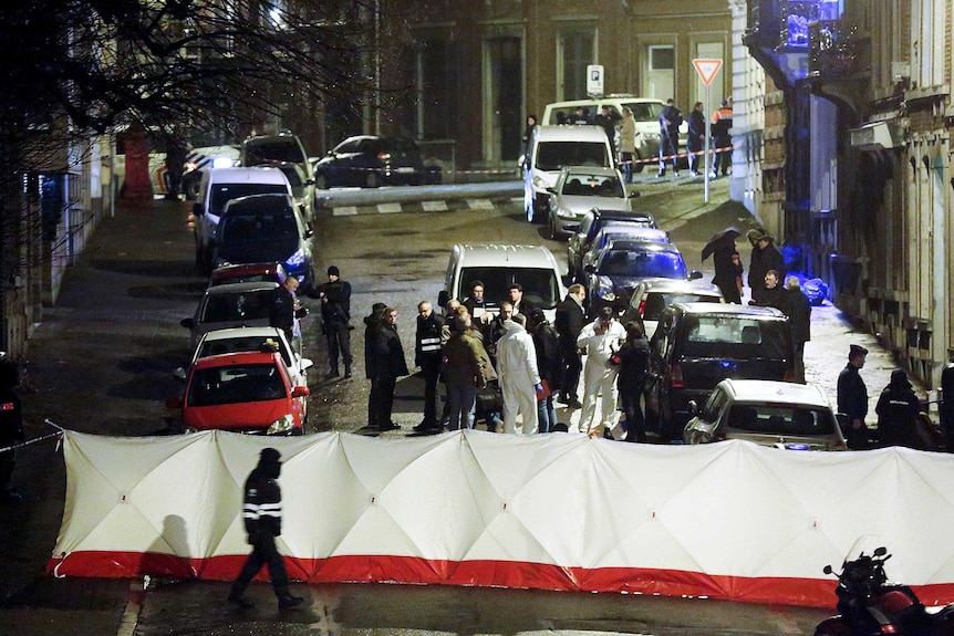 Street closed off after raids