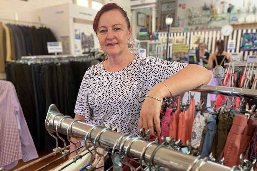 Natalie Tuffley stands inside the Vinnies Store at Paddington in Brisbane.