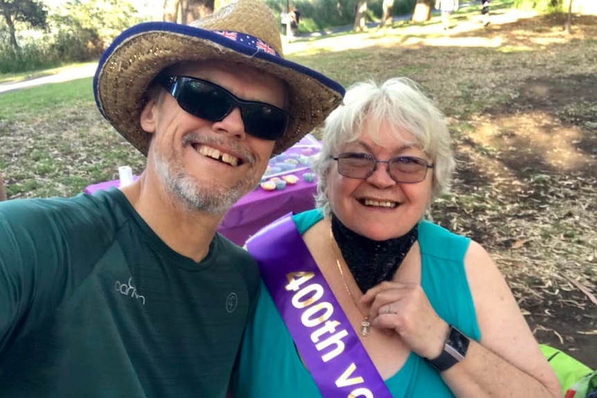 Merrilyn McMillan smiles for the camera with another parkrun volunteer