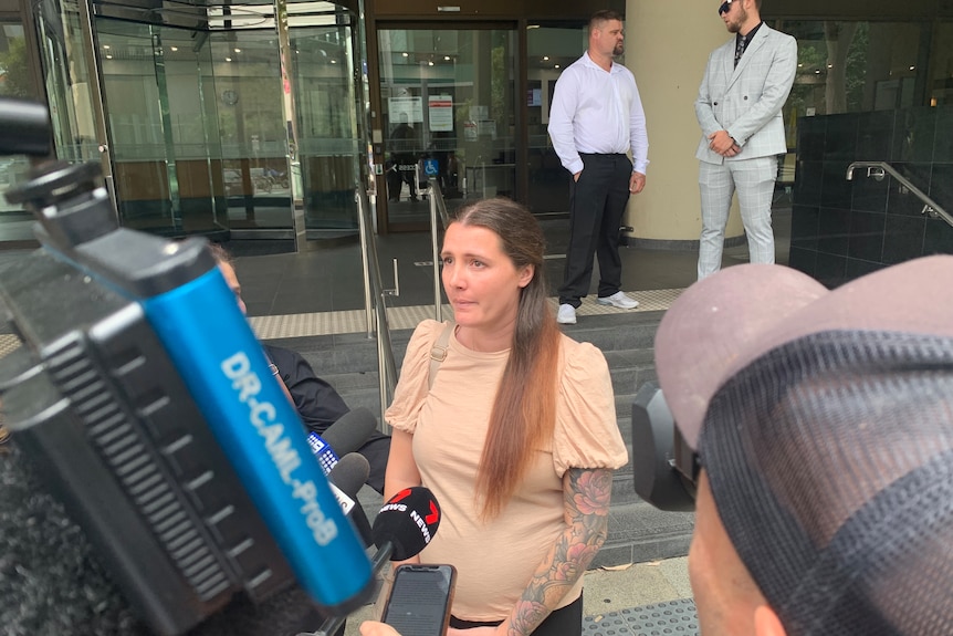 Iveta Mitchell's daughter Alana Kilsby speaks outside court