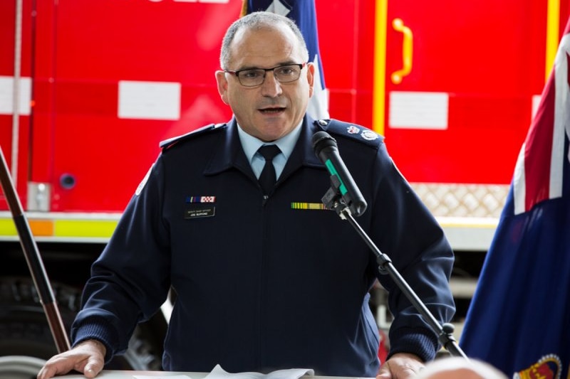 A profile photo of a man in uniform.