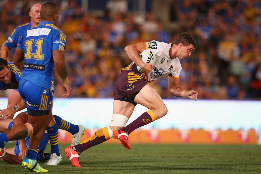 Brisbane Broncos' Corey Oates makes a break against Parramatta