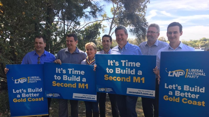 LNP MPs and candidates at a press conference to launch a petition for a duplication of the M1.