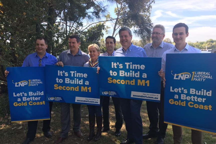 LNP MPs and candidates at a press conference to launch a petition for a duplication of the M1.