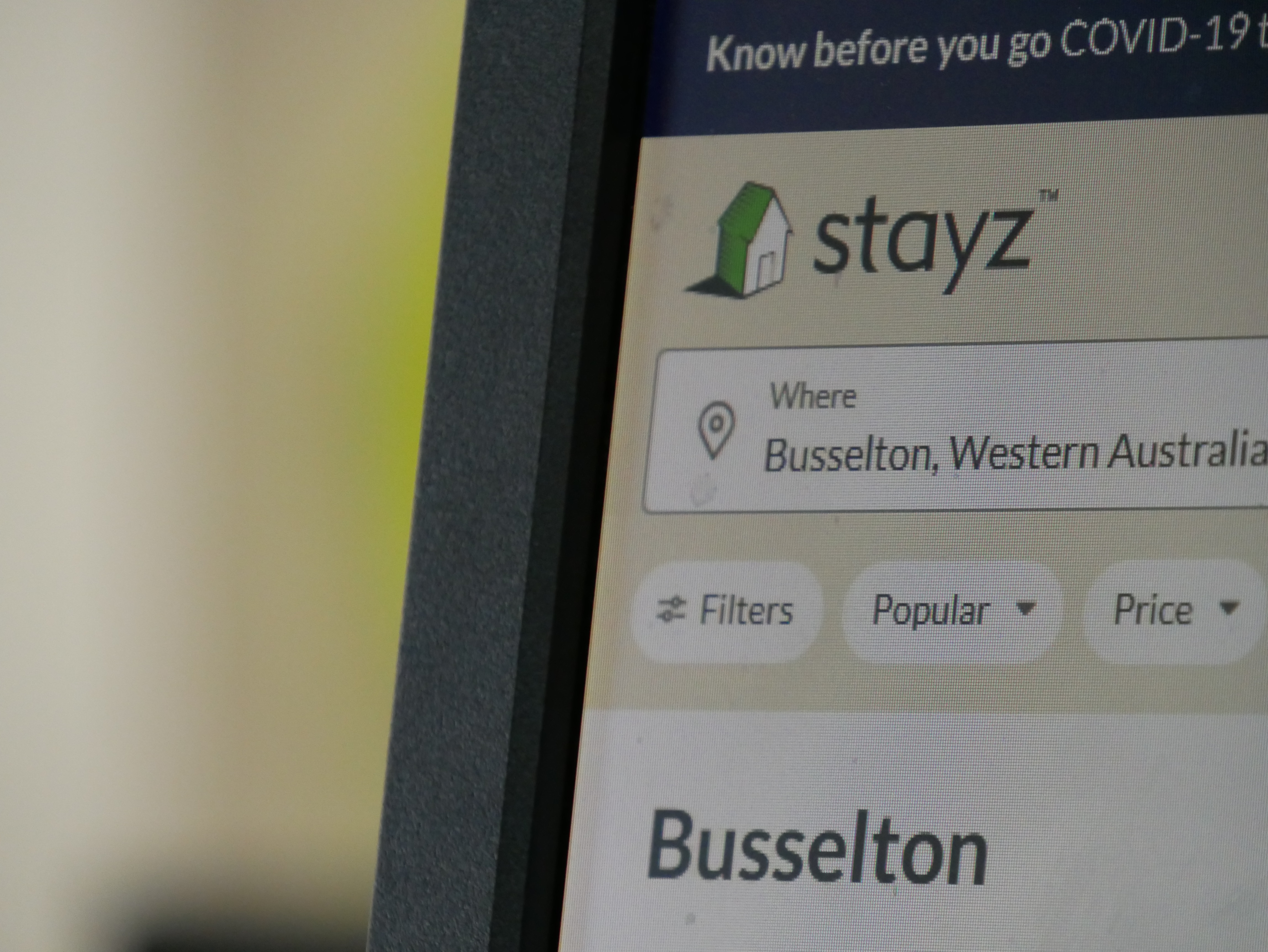 A computer screen with the Stayz website getting visited