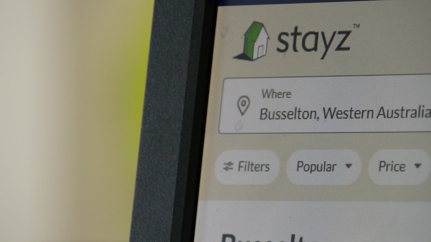 A computer screen with the Stayz website getting visited