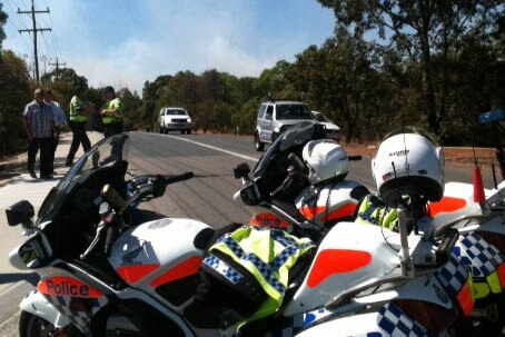 Police motorbikes at roadblock
