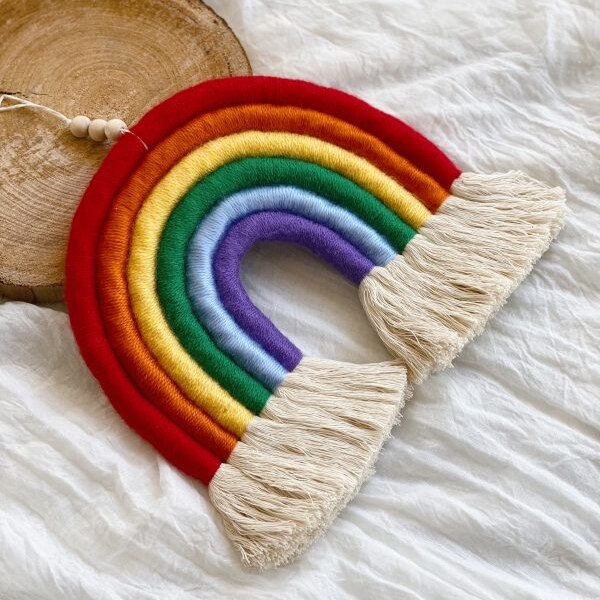 A fibre arts rainbow made by founder and creator of Lennon+Me, Oznur Demirhan