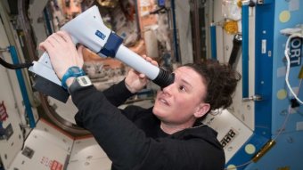 Astronaut Serena Auñón-Chancellor examines her eye with a Fundoscope aboard the International Space Station.