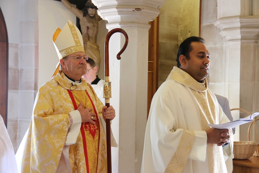 Julian Porteous holds the service at St Mary's Cathedral.