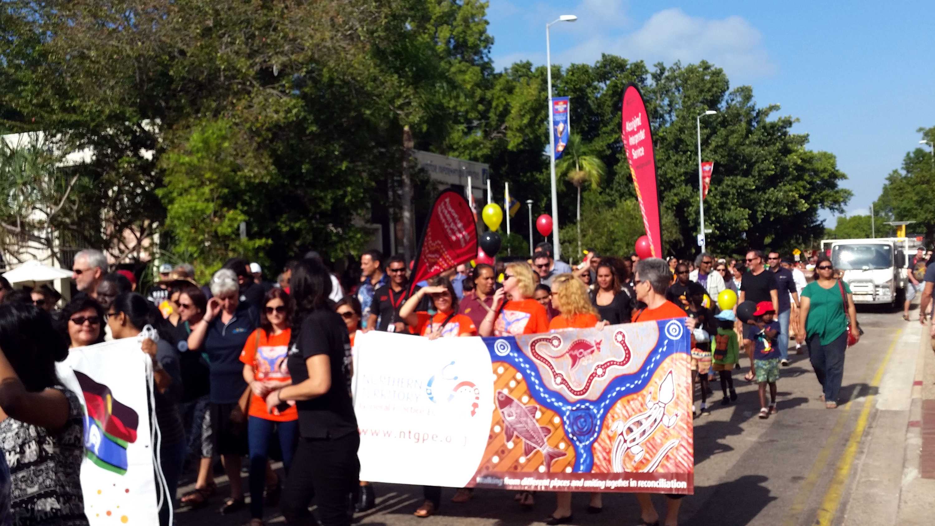 Hundreds of people turn out for NAIDOC Week march in Darwin and Alice ...