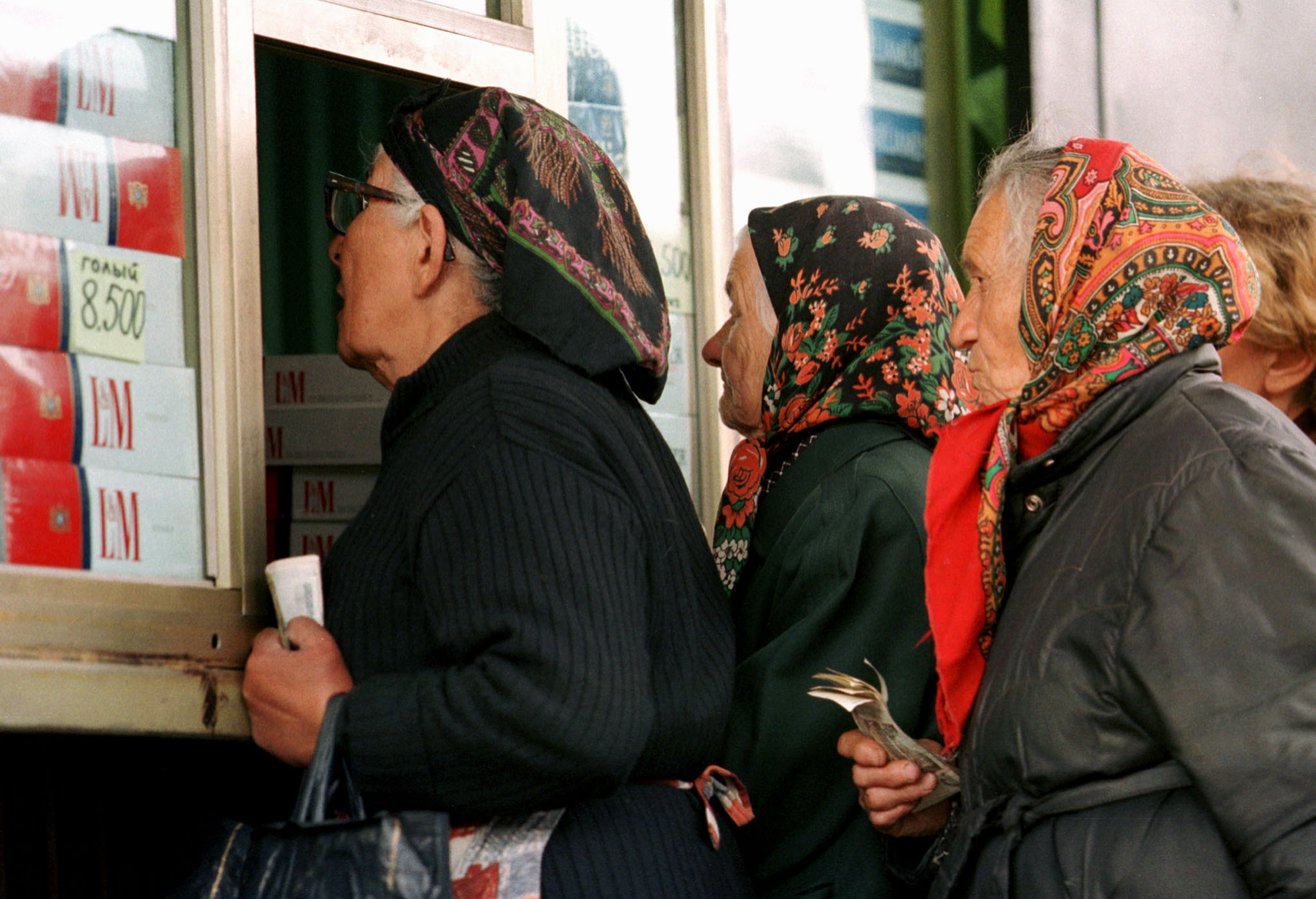 Russian women queue to buy cigarettes