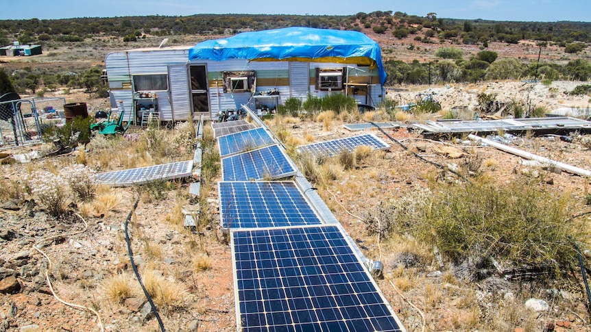 Solar panels power caravan in outback WA.