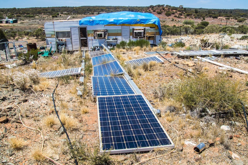 Solar panels power caravan in outback WA.