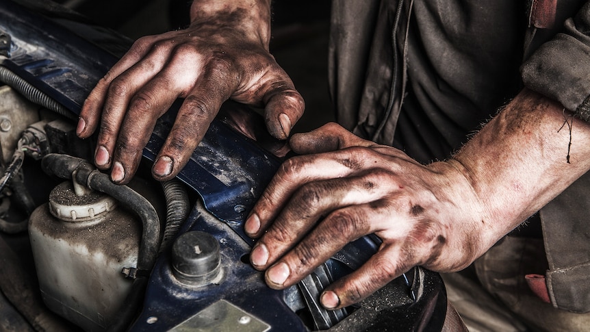 Close up of mechanic hands