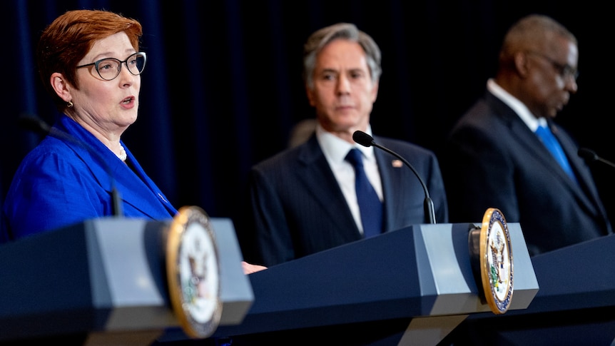 Australian Foreign Minister Marise Payne and US Secretary of State Anthony Blinken speak from lecterns at a bilateral meet