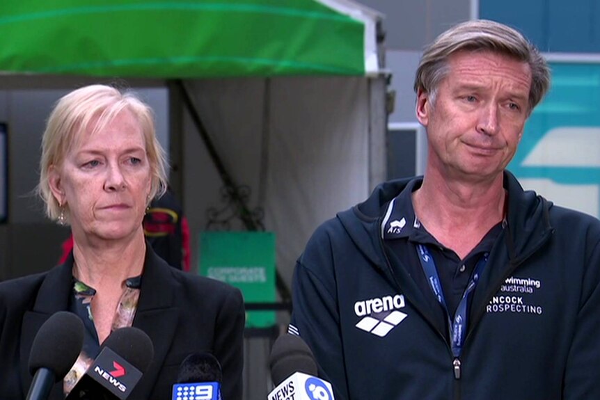 Swimming Australia director Tracy Stockwell and chief executive Alex Baumann at a media conference.