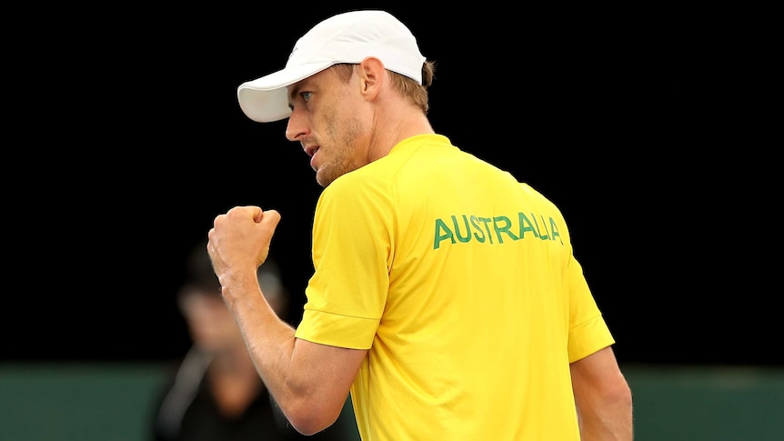 An Australian tennis player pumps his fist during his country's Davis Cup tie against Brazil.
