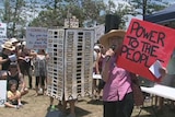 Protesters rally on Qld's Sunshine Coast to stop the local council changing planning laws for high-rise developments at Yaroomba
