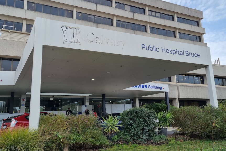 The "Calvary" in the sign of the front of the public hospital in Bruce has been removed, leaving a faint outline still visible.