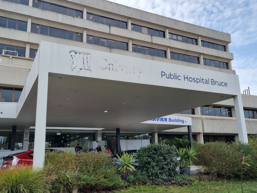 The "Calvary" in the sign of the front of the public hospital in Bruce has been removed, leaving a faint outline still visible.