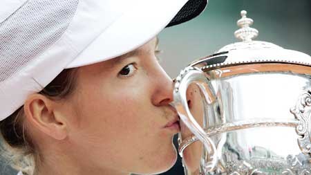 Henin-Hardenne celebrates her second French Open title.