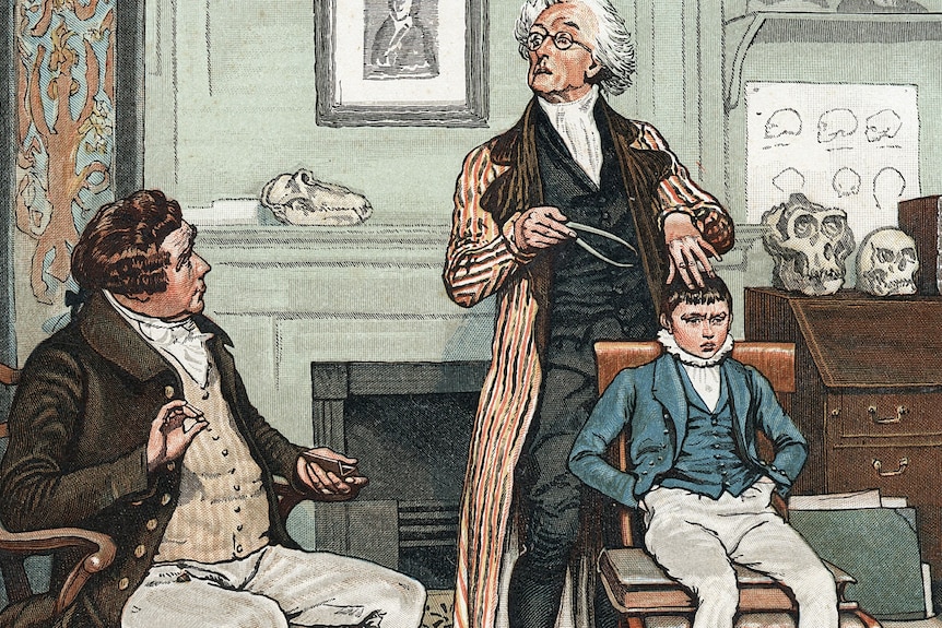 An 1800s illustration of a man in a coat measuring a young boy's head as his father watches, all dressed in fine clothes